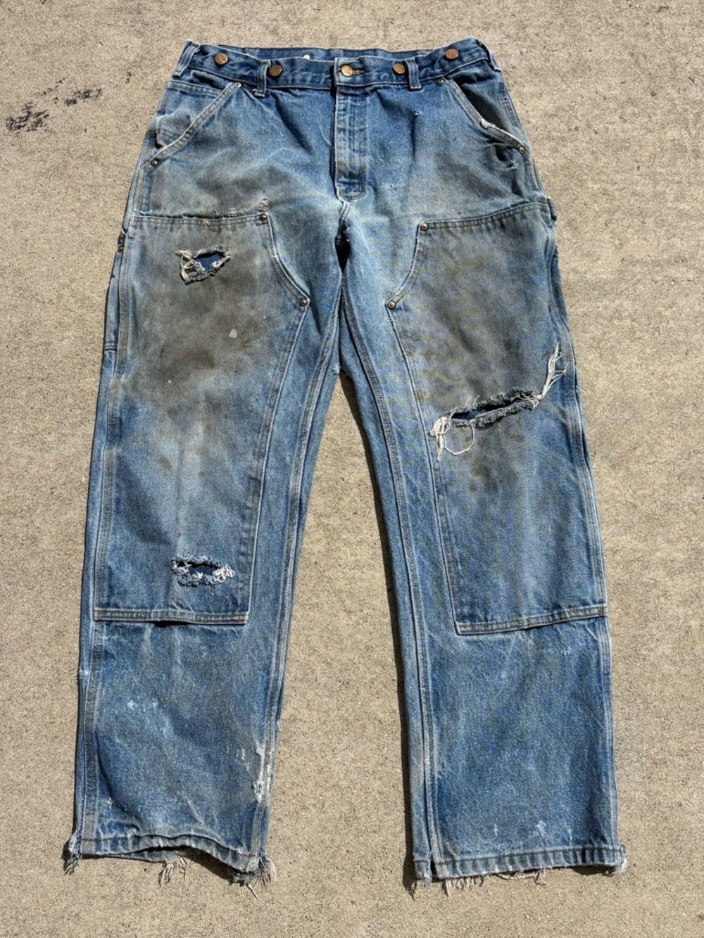 Old beat up Carhartt double knees